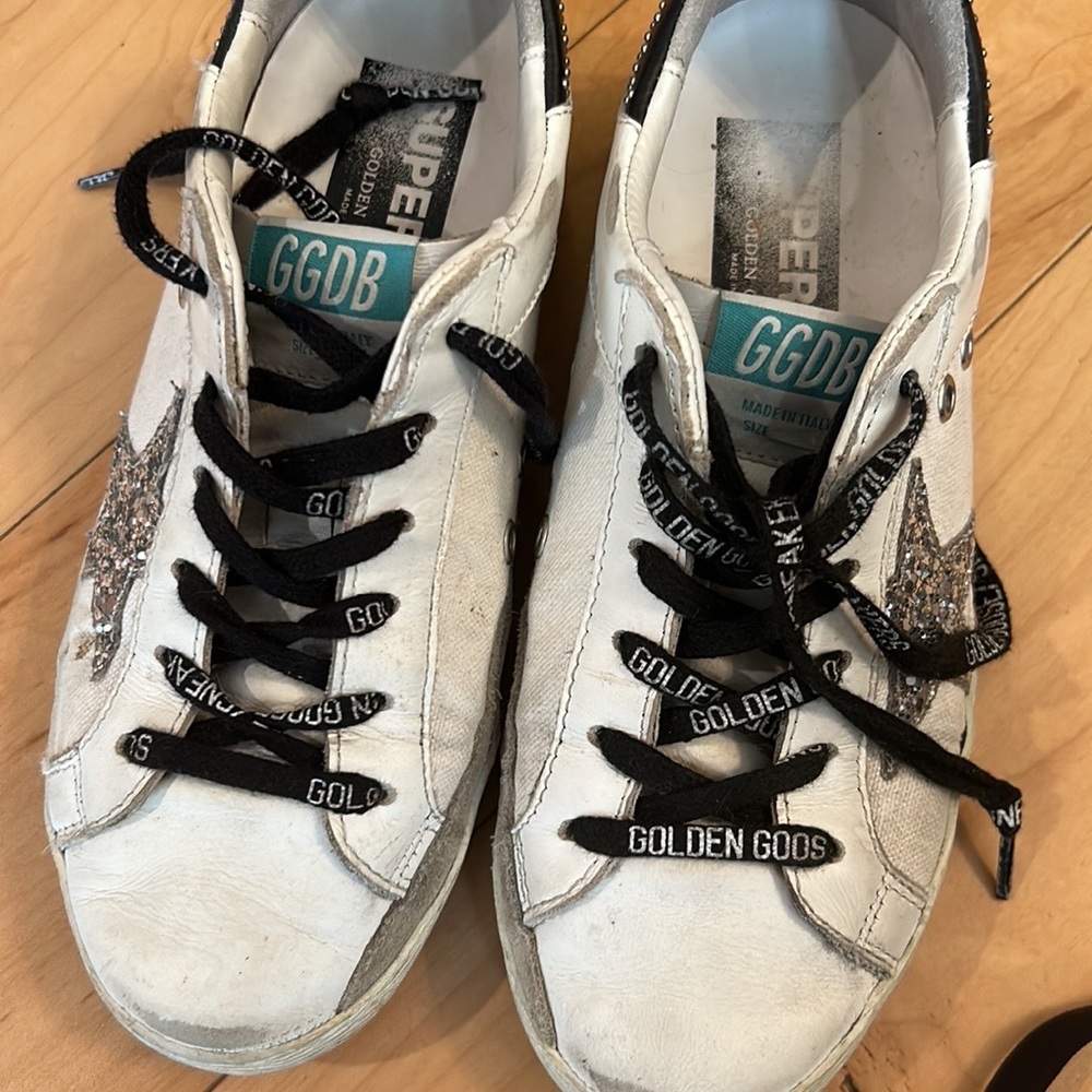 GOLDEN GOOSE SNEAKERS SIZE W6. Black and white with silver sequin stars.